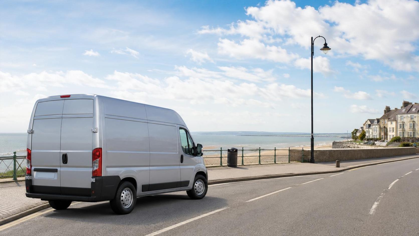 Clean rental van on a seafront road near Burnham-on-Sea with sea in the background